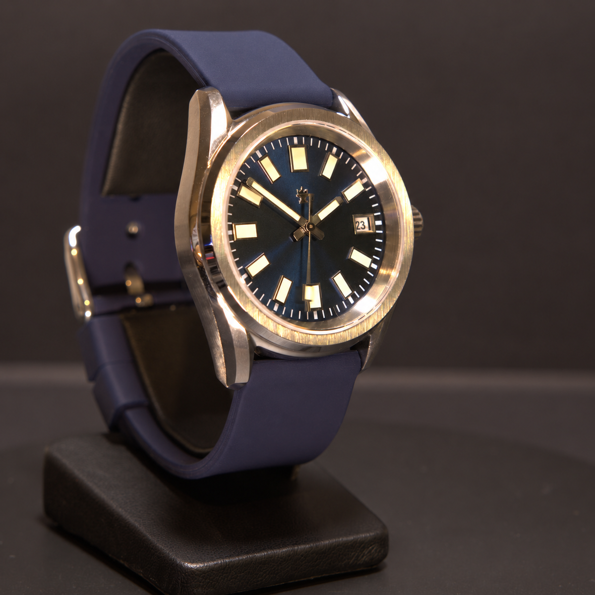 Crown Harbor Automatic from the side opposite the crown, showing its blue dial, stainless steel case, and silicone strap